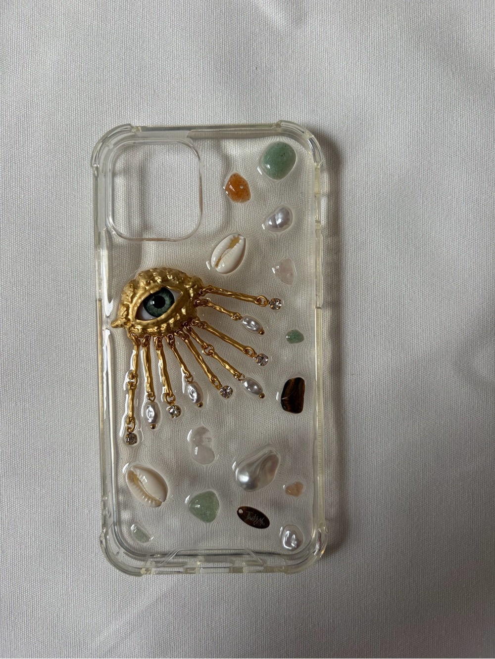 Clear Decorative iPhone 12 Case with Gold Eye Accent - Clear